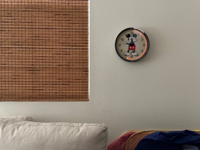 Alexa clock with a Mickey Mouse theme displaying a red countdown timer.